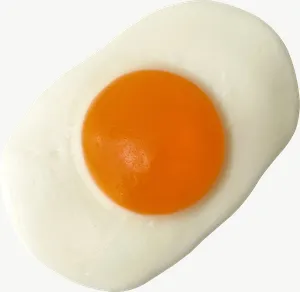 Fried egg gummy candy PNG with transparent background, real photo cutout