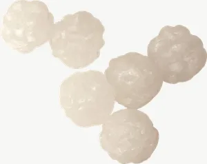 White candy dots PNG with transparent background, real photo cutout